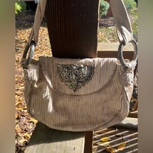 Monserat de Lucca cream leather boho distressed shoulder bag metal silver